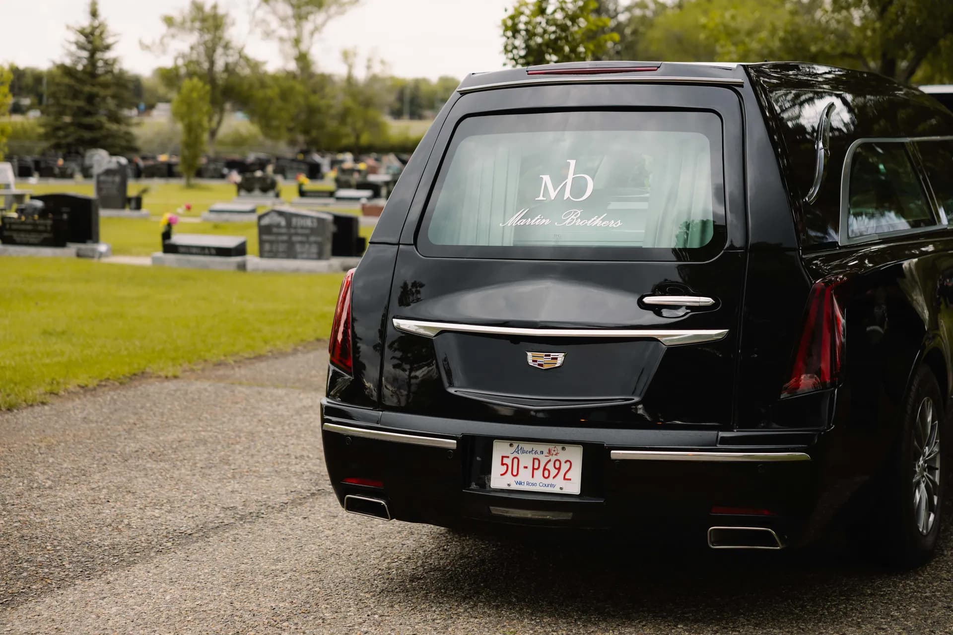 A Martin Brothers hearse at the cemetery